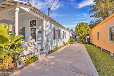 This charming cottage and guest house on the second block of on The Bridges Golf Club At Hollywood Casino in Mississippi - for sale on GolfHomes.com, golf home, golf lot