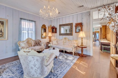 This charming cottage and guest house on the second block of on The Bridges Golf Club At Hollywood Casino in Mississippi - for sale on GolfHomes.com, golf home, golf lot