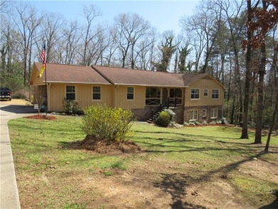 Sprawling brick ranch over full basement located in great area on Cherokee Golf and Country Club in Georgia - for sale on GolfHomes.com, golf home, golf lot