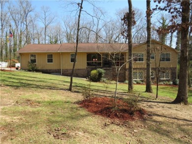 Sprawling brick ranch over full basement located in great area on Cherokee Golf and Country Club in Georgia - for sale on GolfHomes.com, golf home, golf lot