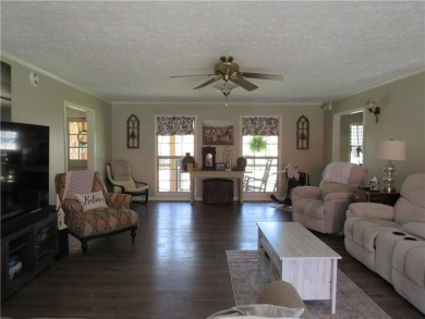 Sprawling brick ranch over full basement located in great area on Cherokee Golf and Country Club in Georgia - for sale on GolfHomes.com, golf home, golf lot