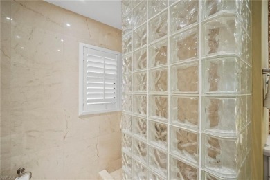Pelican Bay - Luxury Turn-Key Condo on the Beach. This on Club at Pelican Bay Golf Course in Florida - for sale on GolfHomes.com, golf home, golf lot