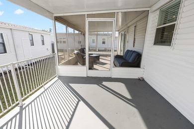 Well-designed 3/2 split bedroom home featuring spacious living on Barefoot Bay Golf Course in Florida - for sale on GolfHomes.com, golf home, golf lot