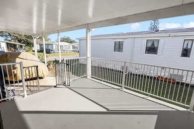 Well-designed 3/2 split bedroom home featuring spacious living on Barefoot Bay Golf Course in Florida - for sale on GolfHomes.com, golf home, golf lot