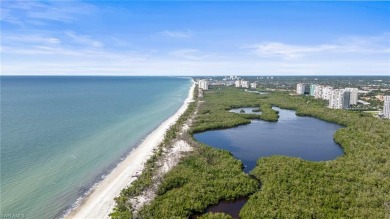 Pelican Bay - Luxury Turn-Key Condo on the Beach. This on Club at Pelican Bay Golf Course in Florida - for sale on GolfHomes.com, golf home, golf lot