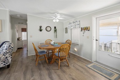 Well-designed 3/2 split bedroom home featuring spacious living on Barefoot Bay Golf Course in Florida - for sale on GolfHomes.com, golf home, golf lot