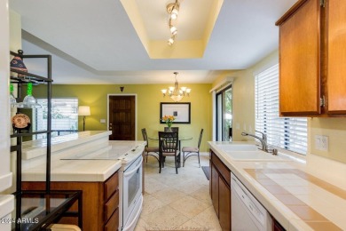 Located in a serene golf course setting, this lovely 2-bedroom on Arizona Grand Resort Golf Course in Arizona - for sale on GolfHomes.com, golf home, golf lot