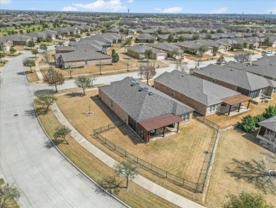 Pride of ownership shines in this exceptional single-story home on Frisco Lakes Golf Course in Texas - for sale on GolfHomes.com, golf home, golf lot