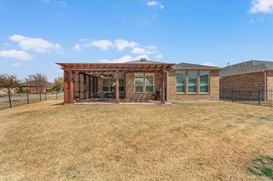 Pride of ownership shines in this exceptional single-story home on Frisco Lakes Golf Course in Texas - for sale on GolfHomes.com, golf home, golf lot
