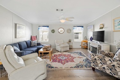 Well-designed 3/2 split bedroom home featuring spacious living on Barefoot Bay Golf Course in Florida - for sale on GolfHomes.com, golf home, golf lot