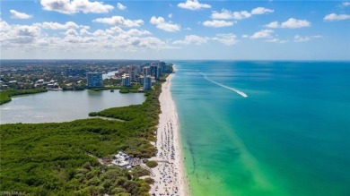 Pelican Bay - Luxury Turn-Key Condo on the Beach. This on Club at Pelican Bay Golf Course in Florida - for sale on GolfHomes.com, golf home, golf lot