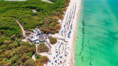 Pelican Bay - Luxury Turn-Key Condo on the Beach. This on Club at Pelican Bay Golf Course in Florida - for sale on GolfHomes.com, golf home, golf lot