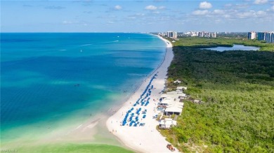 Pelican Bay - Luxury Turn-Key Condo on the Beach. This on Club at Pelican Bay Golf Course in Florida - for sale on GolfHomes.com, golf home, golf lot