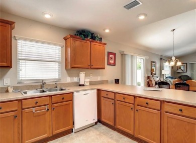 Immaculate 2 bedroom, 2 bath STUCCO BUNGALOW VILLA in Bartow on Pennbrooke Fairways in Florida - for sale on GolfHomes.com, golf home, golf lot