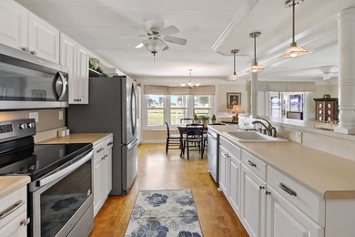 2bed/2bath home with a lovely golf course view in Barefoot Bay! on Barefoot Bay Golf Course in Florida - for sale on GolfHomes.com, golf home, golf lot