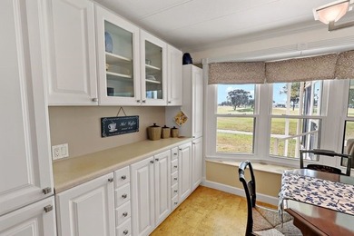 2bed/2bath home with a lovely golf course view in Barefoot Bay! on Barefoot Bay Golf Course in Florida - for sale on GolfHomes.com, golf home, golf lot