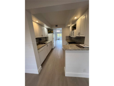Rare Oversized Corner Unit in Century Village 55+ - 2 on Flamingo Lakes Country Club in Florida - for sale on GolfHomes.com, golf home, golf lot
