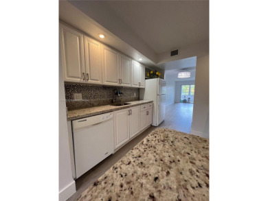 Rare Oversized Corner Unit in Century Village 55+ - 2 on Flamingo Lakes Country Club in Florida - for sale on GolfHomes.com, golf home, golf lot