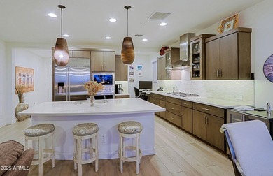 This home is a must see-Located in Trilogy at Verde River Golf & on Vista Verde Golf Course in Arizona - for sale on GolfHomes.com, golf home, golf lot