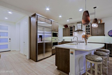 This home is a must see-Located in Trilogy at Verde River Golf & on Vista Verde Golf Course in Arizona - for sale on GolfHomes.com, golf home, golf lot