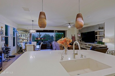 This home is a must see-Located in Trilogy at Verde River Golf & on Vista Verde Golf Course in Arizona - for sale on GolfHomes.com, golf home, golf lot