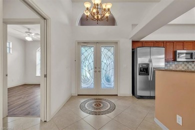 Welcome Home to Longshore Lake! From the moment you step inside on Quail Village Golf Course in Florida - for sale on GolfHomes.com, golf home, golf lot