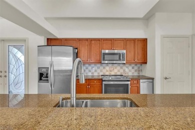 Welcome Home to Longshore Lake! From the moment you step inside on Quail Village Golf Course in Florida - for sale on GolfHomes.com, golf home, golf lot