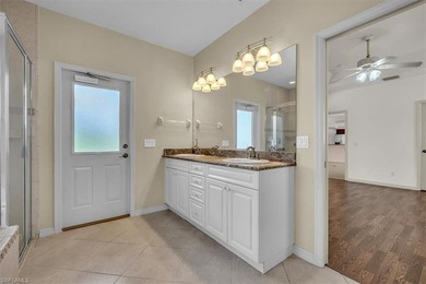 Welcome Home to Longshore Lake! From the moment you step inside on Quail Village Golf Course in Florida - for sale on GolfHomes.com, golf home, golf lot