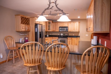 Spacious & Fully Furnished Condo in Northern Bay! This 4-bedroom on Northern Bay Golf Resort and Marina in Wisconsin - for sale on GolfHomes.com, golf home, golf lot