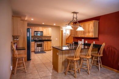 Spacious & Fully Furnished Condo in Northern Bay! This 4-bedroom on Northern Bay Golf Resort and Marina in Wisconsin - for sale on GolfHomes.com, golf home, golf lot