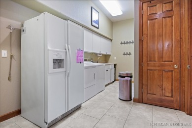 Discover the perfect blend of elegance and comfort in this on The Oaks Golf Course in Missouri - for sale on GolfHomes.com, golf home, golf lot