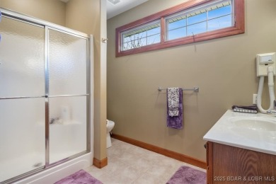 Discover the perfect blend of elegance and comfort in this on The Oaks Golf Course in Missouri - for sale on GolfHomes.com, golf home, golf lot