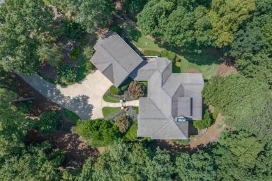 Tucked away on a beautifully landscaped, private lot, this on Reynolds Lake Oconee - The Oconee in Georgia - for sale on GolfHomes.com, golf home, golf lot