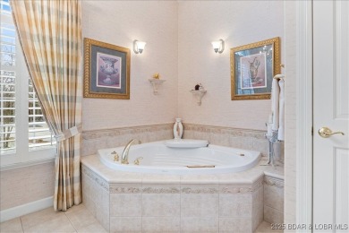 Discover the perfect blend of elegance and comfort in this on The Oaks Golf Course in Missouri - for sale on GolfHomes.com, golf home, golf lot