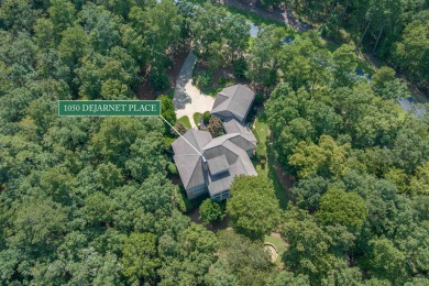 Tucked away on a beautifully landscaped, private lot, this on Reynolds Lake Oconee - The Oconee in Georgia - for sale on GolfHomes.com, golf home, golf lot