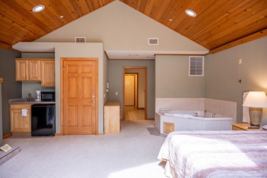 Spacious & Fully Furnished Condo in Northern Bay! This 4-bedroom on Northern Bay Golf Resort and Marina in Wisconsin - for sale on GolfHomes.com, golf home, golf lot