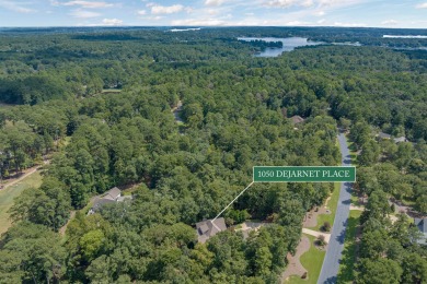 Tucked away on a beautifully landscaped, private lot, this on Reynolds Lake Oconee - The Oconee in Georgia - for sale on GolfHomes.com, golf home, golf lot