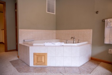 Spacious & Fully Furnished Condo in Northern Bay! This 4-bedroom on Northern Bay Golf Resort and Marina in Wisconsin - for sale on GolfHomes.com, golf home, golf lot