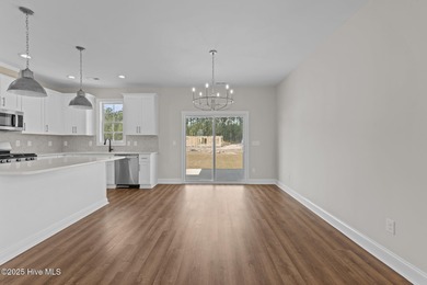 BUILDER NOW OFFERING $25,000 USE AS YOU CHOOSE - must closed by on Carolina Colours Golf Club in North Carolina - for sale on GolfHomes.com, golf home, golf lot