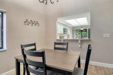 Welcome to your future oasis at 6261 Timber Lake Drive, Unit F6 on Palm Aire Country Club of Sarasota in Florida - for sale on GolfHomes.com, golf home, golf lot