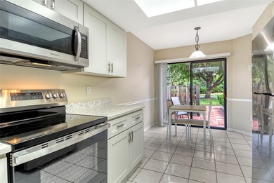 Welcome to your future oasis at 6261 Timber Lake Drive, Unit F6 on Palm Aire Country Club of Sarasota in Florida - for sale on GolfHomes.com, golf home, golf lot