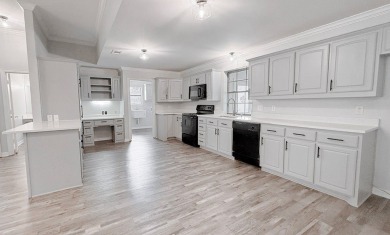 This exceptionally-updated 3 bedroom, 3 bathroom brick home in on Cedar Creek Country Club in Texas - for sale on GolfHomes.com, golf home, golf lot