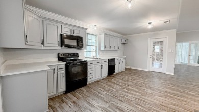 This exceptionally-updated 3 bedroom, 3 bathroom brick home in on Cedar Creek Country Club in Texas - for sale on GolfHomes.com, golf home, golf lot