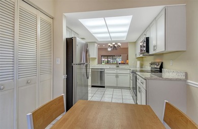 Welcome to your future oasis at 6261 Timber Lake Drive, Unit F6 on Palm Aire Country Club of Sarasota in Florida - for sale on GolfHomes.com, golf home, golf lot