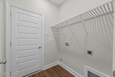 This beautifully designed New Castle II floor plan offers the on Carolina Colours Golf Club in North Carolina - for sale on GolfHomes.com, golf home, golf lot