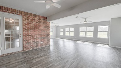 This exceptionally-updated 3 bedroom, 3 bathroom brick home in on Cedar Creek Country Club in Texas - for sale on GolfHomes.com, golf home, golf lot