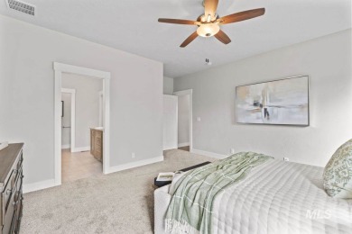 Welcome to this beautifully maintained 4 bedroom, 3 bath home on Hunters Point Golf Club in Idaho - for sale on GolfHomes.com, golf home, golf lot