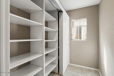 Open floor plan with with Great room, dining area and kitchen on Eagles Nest at Pebble Creek in Arizona - for sale on GolfHomes.com, golf home, golf lot