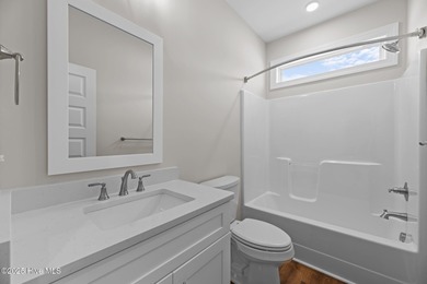 BUILDER NOW OFFERING $25,000 USE AS YOU CHOOSE - must closed by on Carolina Colours Golf Club in North Carolina - for sale on GolfHomes.com, golf home, golf lot