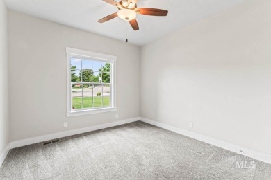 Welcome to this beautifully maintained 4 bedroom, 3 bath home on Hunters Point Golf Club in Idaho - for sale on GolfHomes.com, golf home, golf lot
